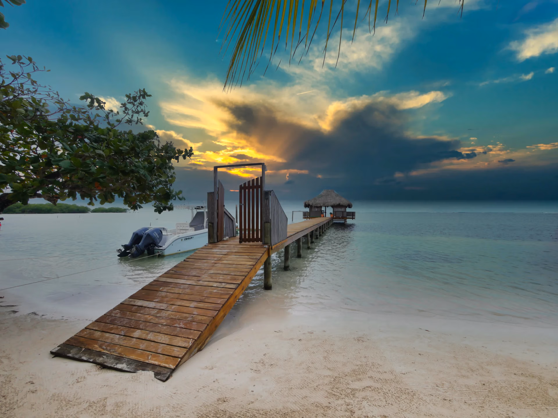 The dock at Sunset at Reefside Retreat